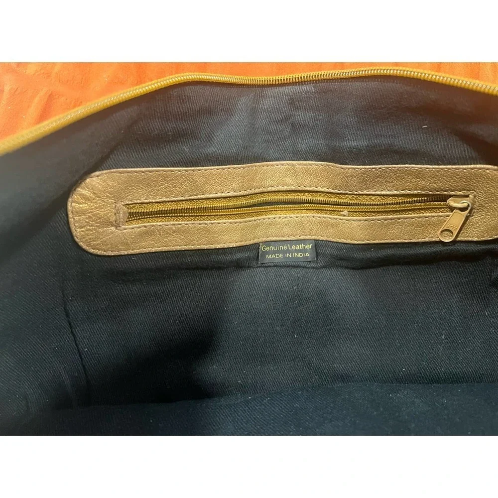 Kenneth Cole Gold Leather clutch bag